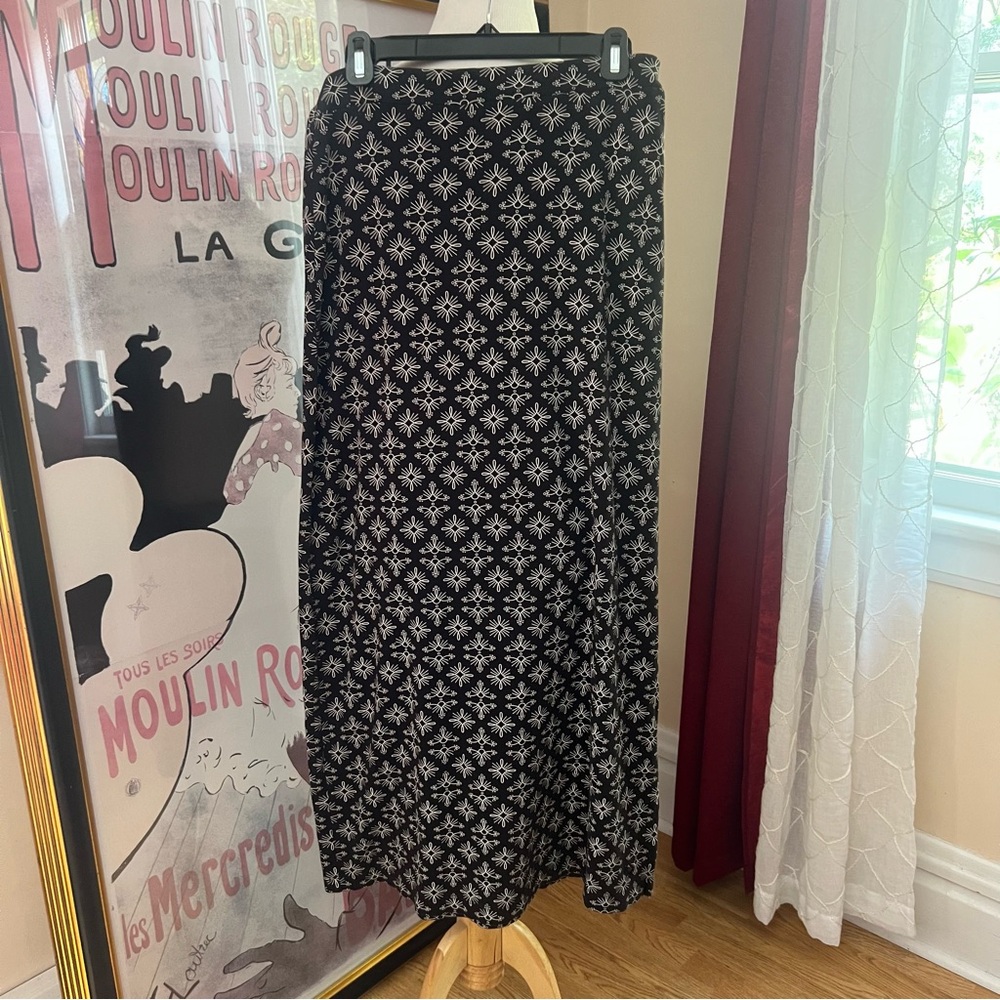 Fair Indigo:100% Organic Pima Cotton Black Tan All Over Print Long Skirt W/ Slit